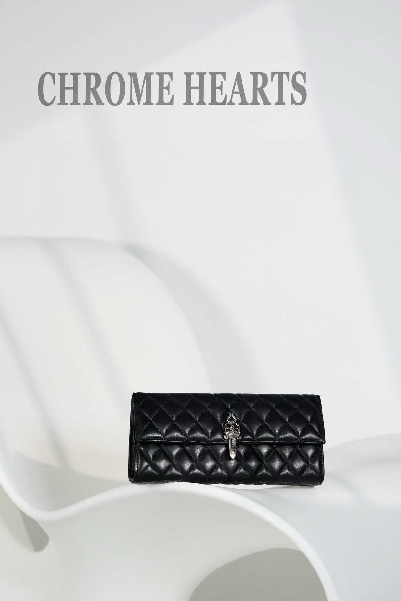 CH Clutch Bag